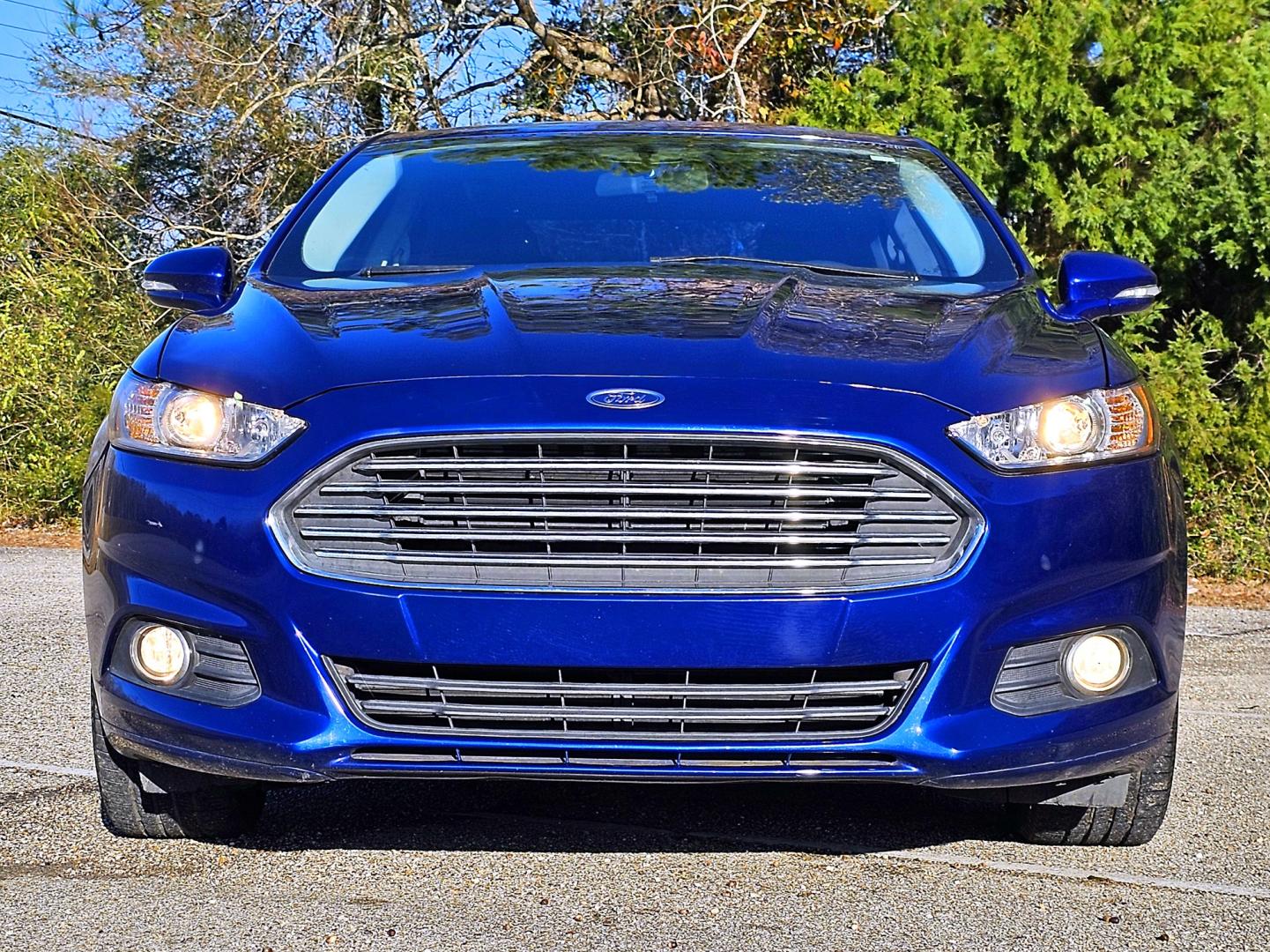 2015 Blue Ford Fusion SE (3FA6P0T96FR) with an 2.0L L4 DOHC 16V engine, Automatic transmission, located at 18001 Kellogg Rd, Saucier, MS, 39574, (228) 832-1441, 39.421459, -76.641457 - Photo#20